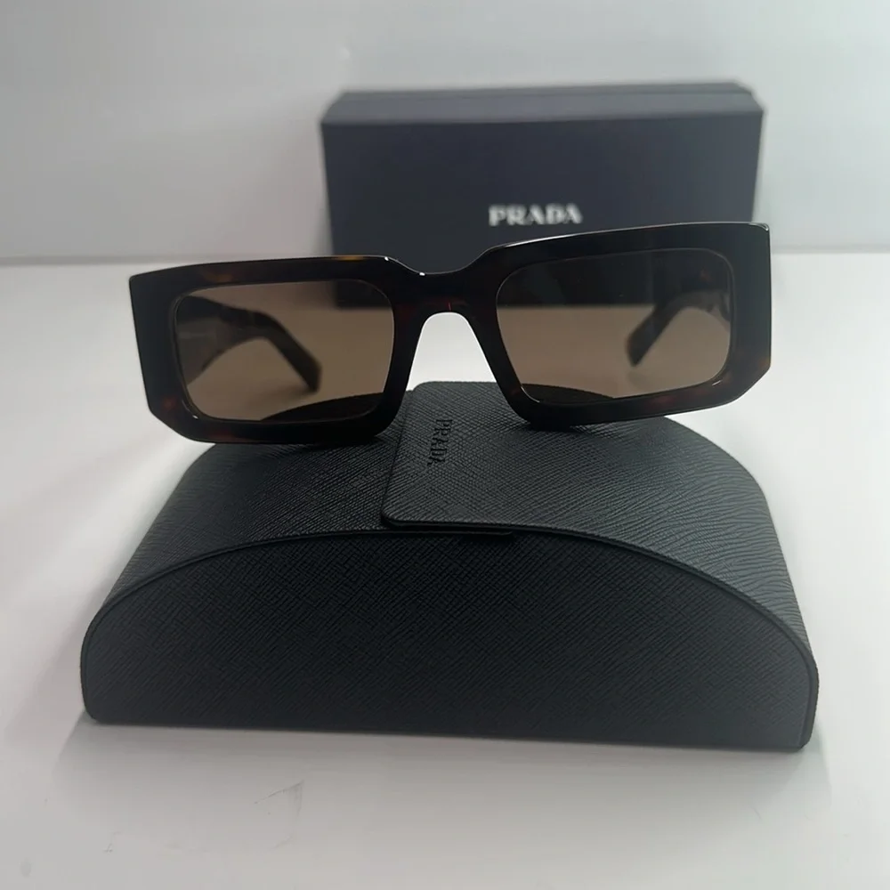 Prada PR06YS Brown Sunglasses with Bold Frames and UV Protection